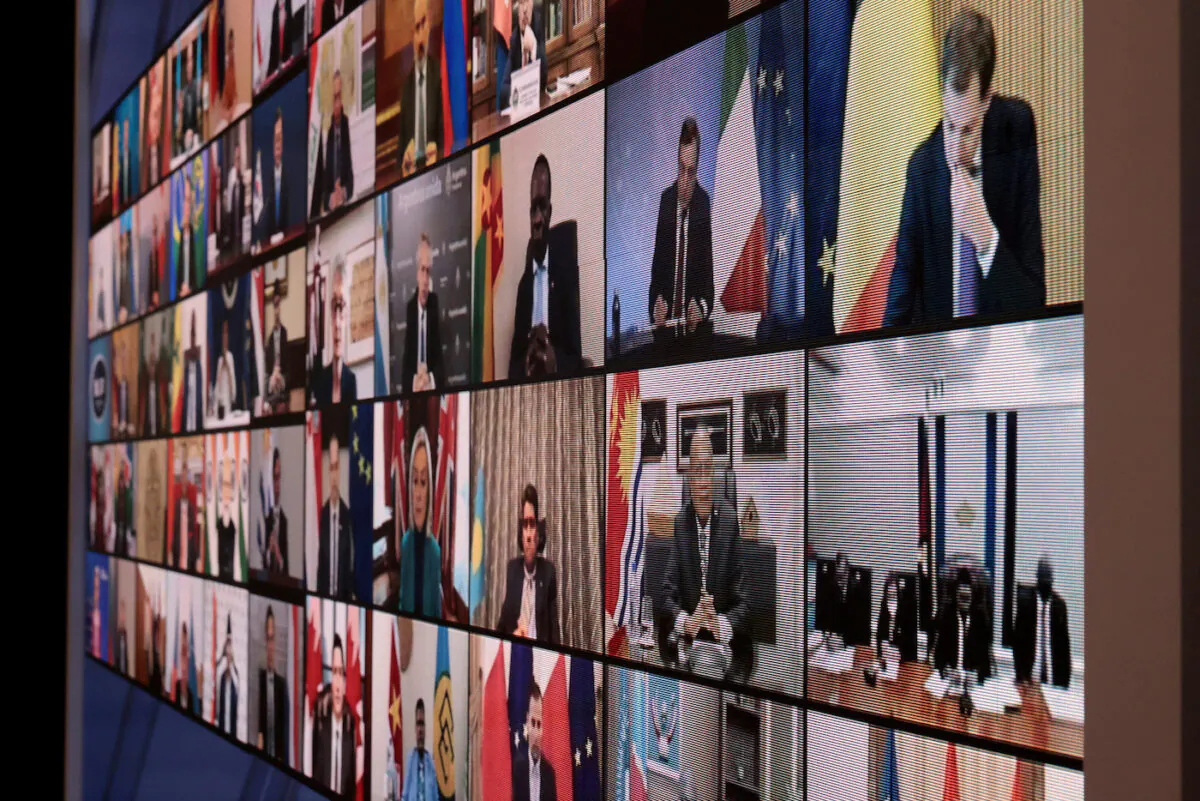 A video wall displaying participants in the White House's Summit for Democracy stands in the South Court Auditorium in Washington on Dec. 9, 2021. (Chip Somodevilla/Getty Images)