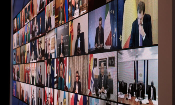 A video wall displaying participants in the White House's Summit for Democracy stands in the South Court Auditorium in Washington on Dec. 9, 2021. (Chip Somodevilla/Getty Images)