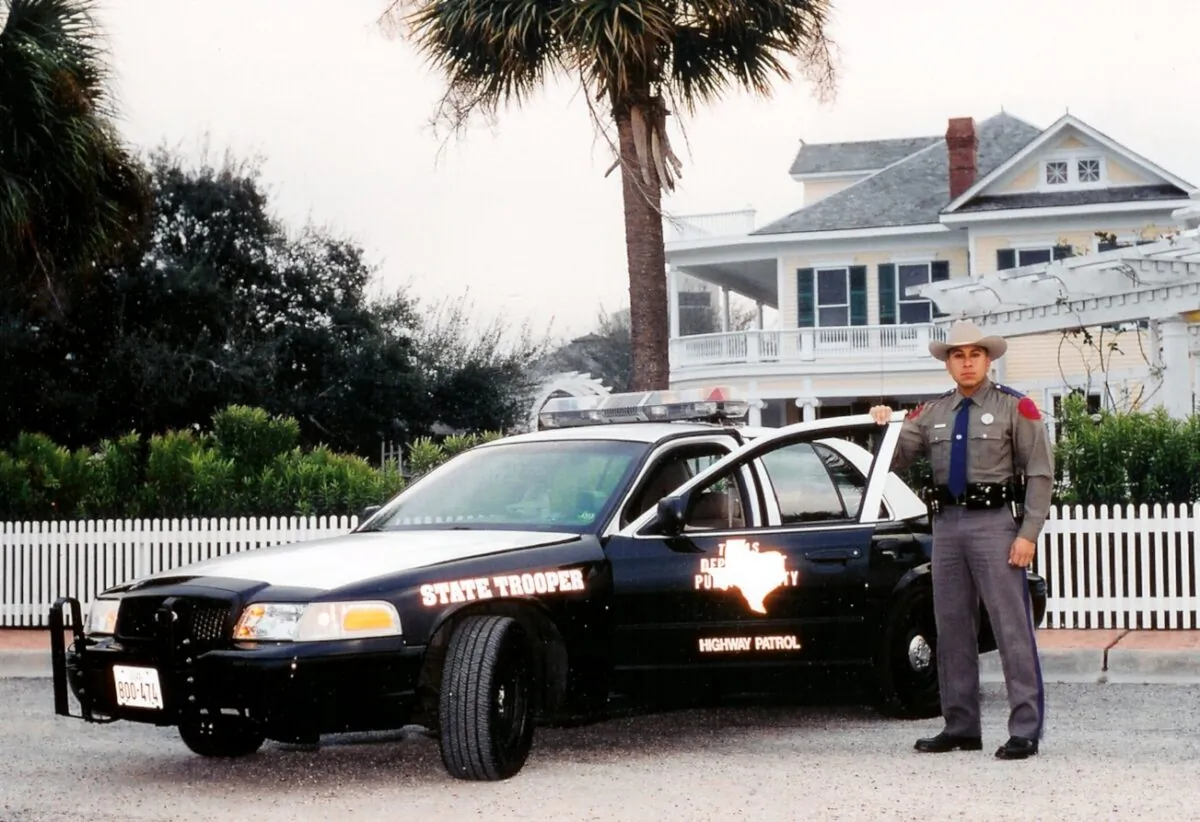 Le Roy Torres pictured with his State Trooper vehicle. (Courtesy of Le Roy Torres)