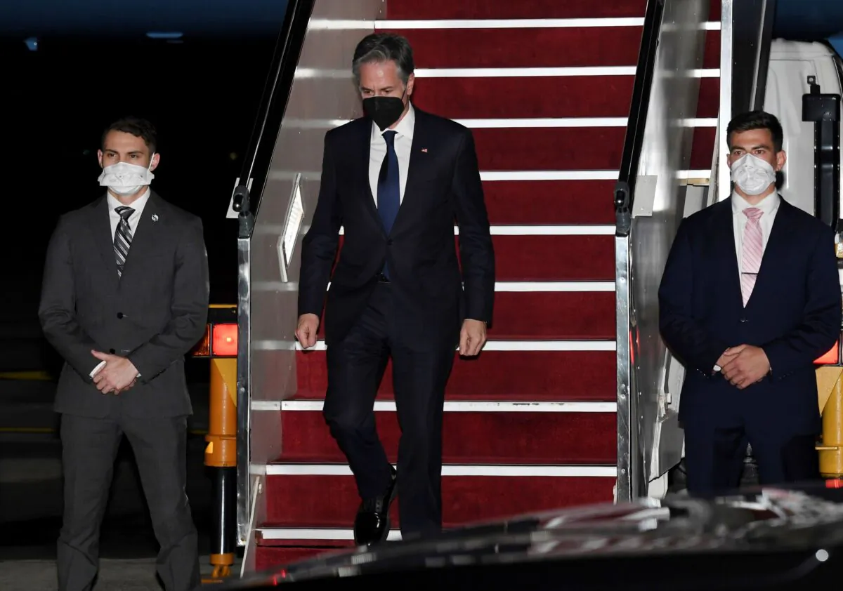 Secretary of State Antony Blinken arrives at Subang Airport, in Kuala Lumpur, Malaysia, on Dec. 14, 2021. (Olivier Douliery/Pool via AP)