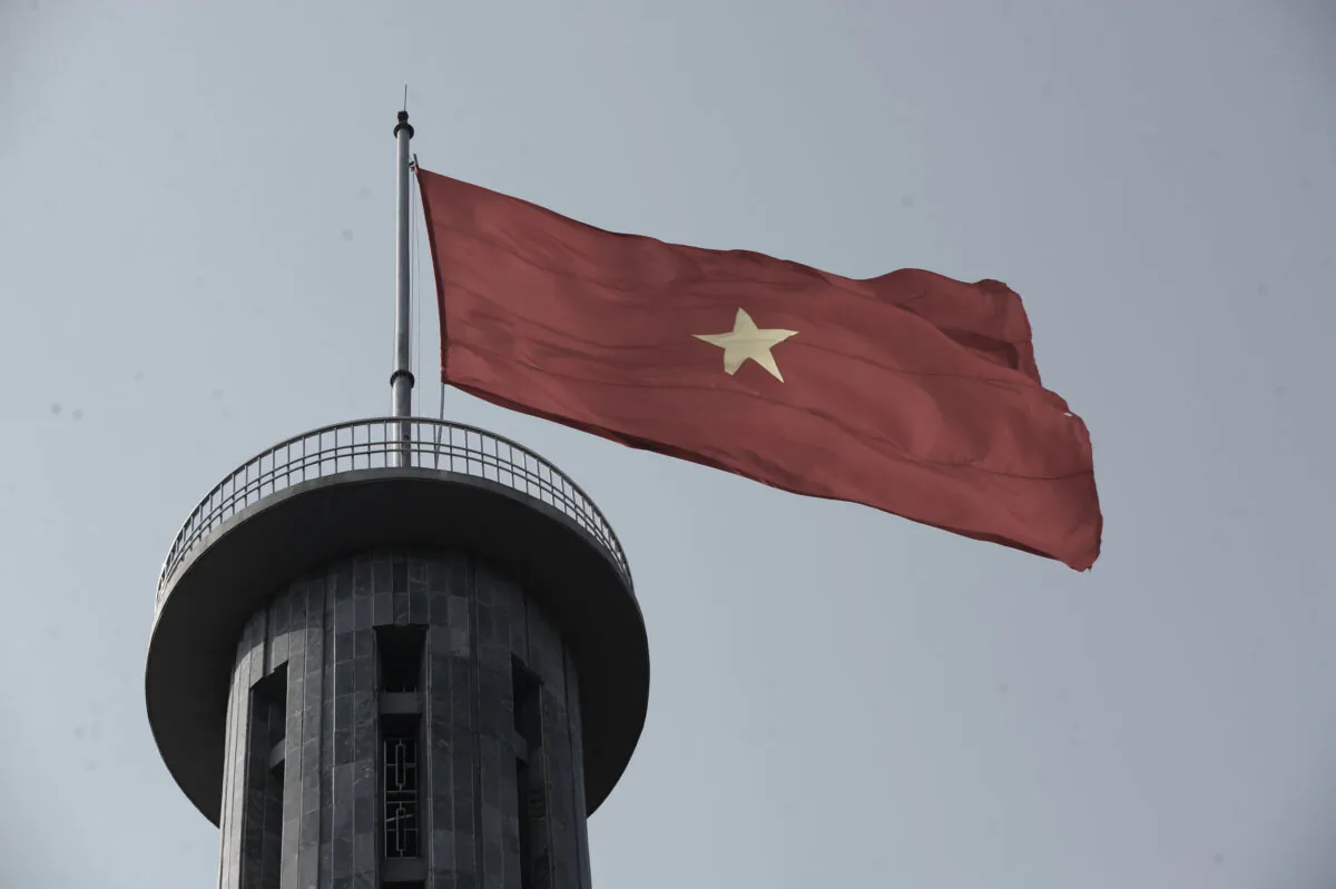 A Vietnamese flag flying atop Lung Cu flag tower in Dong Van district, northern province of Ha Giang, Vietnam, in an undated file photo. (Hoang Dinh Nam/AFP via Getty Images)