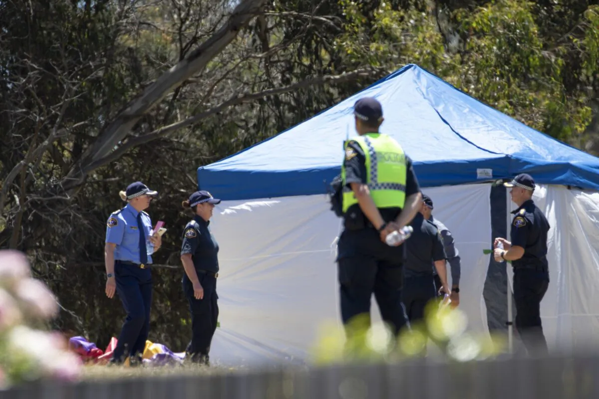 Emergency services personnel work the scene of a deadly incident involved with a jumping castle at the Hillcrest Primary School in Devonport, Tasmania, on Dec. 16, 2021. (Grant Wells/AAP Image via AP)