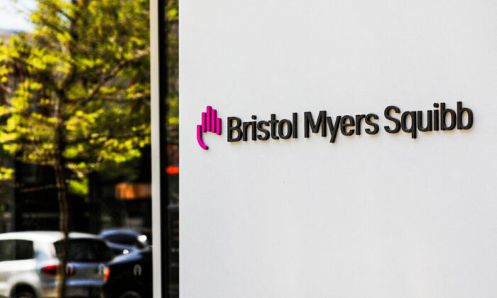 A sign stands outside a Bristol Myers Squibb facility in Cambridge, Mass., on May 20, 2021. (Brian Snyder/Reuters)