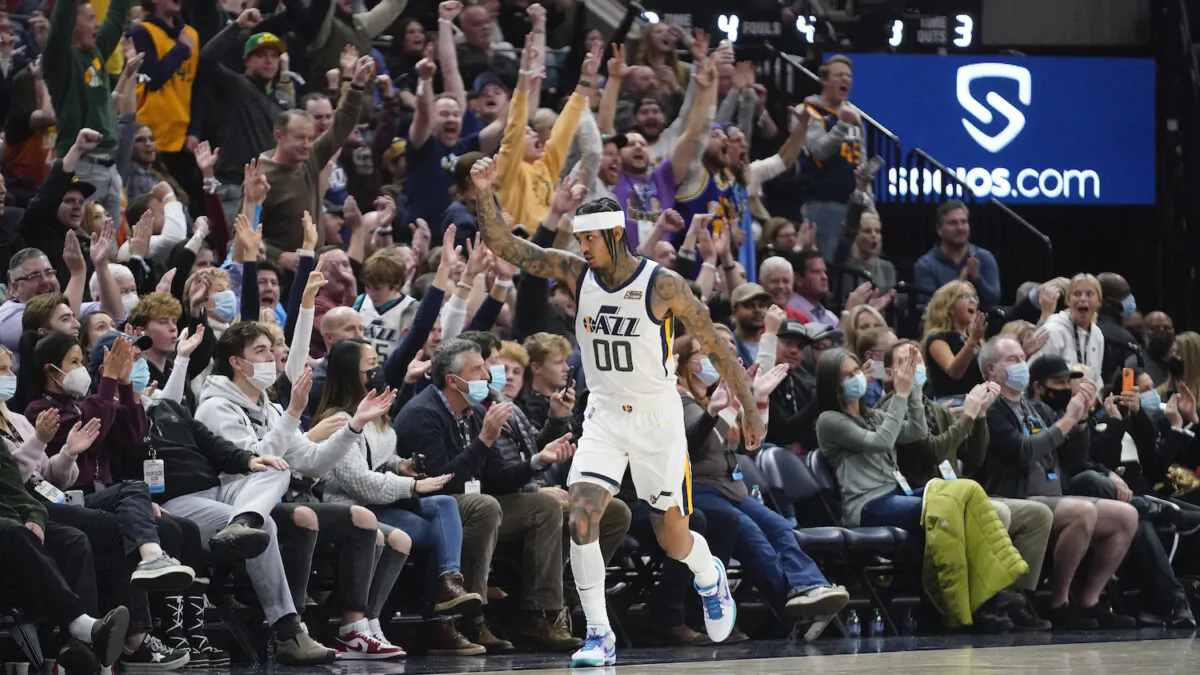 Utah Jazz guard Jordan Clarkson (00) celebrates after making a 3-pointer against the Los Angeles Clippers in the second half during an NBA basketball game in Salt Lake City on Dec. 15, 2021. (AP Photo/Rick Bowmer)