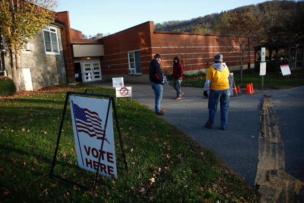 A voter makes his way into a polling place to cast his ballot in the early morning at the Valle Crucis School on Nov. 3, 2020, in Sugar Grove, N.C. (Brian Blanco/Getty Images)
