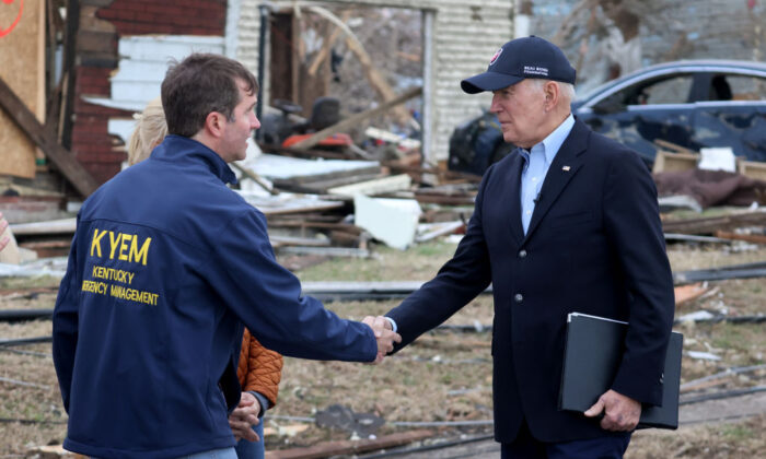 U.S. President Joe Biden greets Kentucky Gov. Andy Beshear after speaking to the press in an area damaged by Friday's tornado in Dawson Springs, Kentucky on Dec. 15, 2021. (Scott Olson/Getty Images)