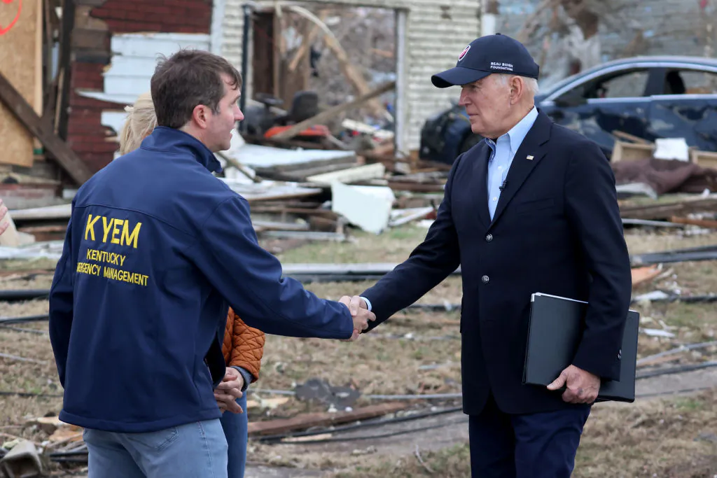 U.S. President Joe Biden greets Kentucky Gov. Andy Beshear after speaking to the press in an area damaged by Friday's tornado in Dawson Springs, Kentucky on Dec. 15, 2021. (Scott Olson/Getty Images)