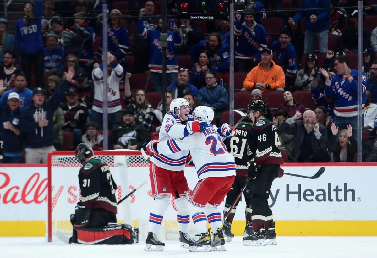New York Rangers right wing Kaapo Kakko (24) celebrates a goal against Arizona Coyotes goalie Scott Wedgewood (31) during an NHL game at Gila River Arena, in Glendale, Ariz., on Dec. 15, 2021. (Joe Camporeale/USA TODAY Sports via Field Level Media)