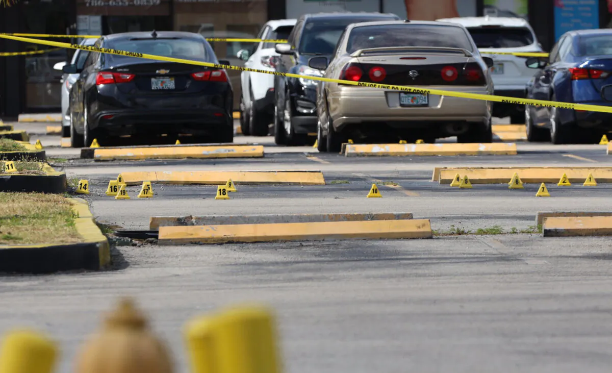 Miami-Dade police investigate a mass shooting at a concert that killed two people and injured more than 20 others in North Miami-Dade, near Miami Gardens, Fla., on May 30, 2021. (Carl Juste/Miami Herald/TNS)