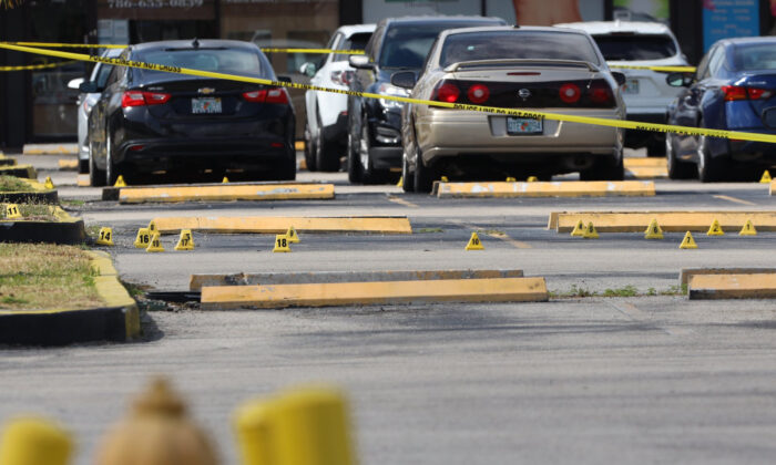 Miami-Dade police investigate a mass shooting at a concert that killed two people and injured more than 20 others in North Miami-Dade, near Miami Gardens, Fla., on May 30, 2021. (Carl Juste/Miami Herald/TNS)