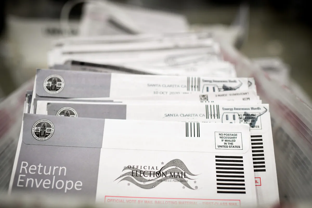 Mail-in ballots in their envelopes await processing at the Los Angeles County Registrar Recorders' mail-in ballot processing center at the Pomona Fairplex in Pomona, Calif., on Oct. 28, 2020. (Robyn Beck/AFP via Getty Images)