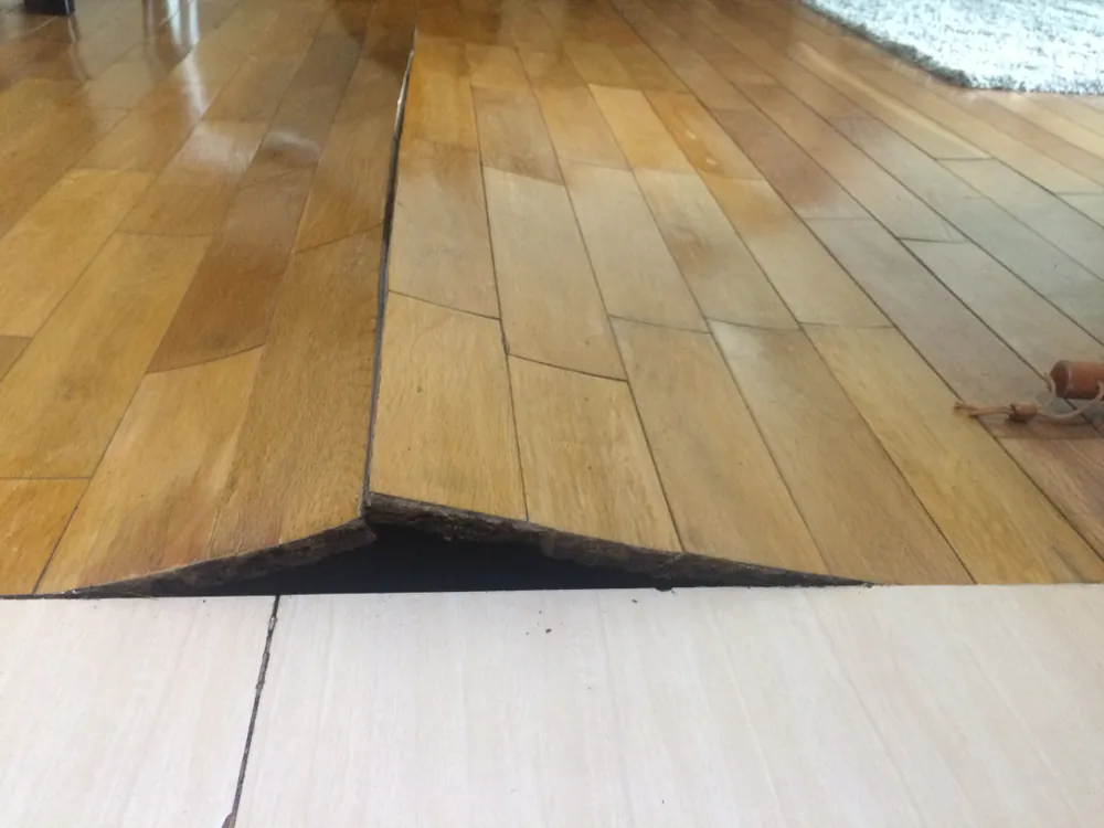 In addition to just looking bad, hardwood flooring problems can increase the chances of someone stumbling, something especially of concern for older people with impaired balance. (Jatuporn Chainiramitkul/Shutterstock)