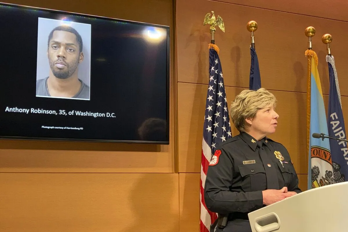 Harrisonburg, Va., Police Chief Kelley Warner discussing murder charges against Anthony Robinson, 35, of Washington, D.C. , at a press conference, in Fairfax, Va., on Dec. 17, 2021. (Matthew Barakat/AP Photo)