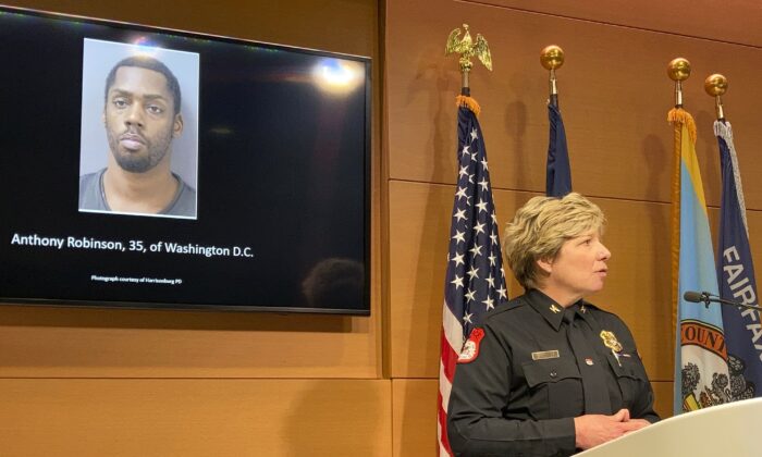 Harrisonburg, Va., Police Chief Kelley Warner discussing murder charges against Anthony Robinson, 35, of Washington, D.C. , at a press conference, in Fairfax, Va., on Dec. 17, 2021. (Matthew Barakat/AP Photo)