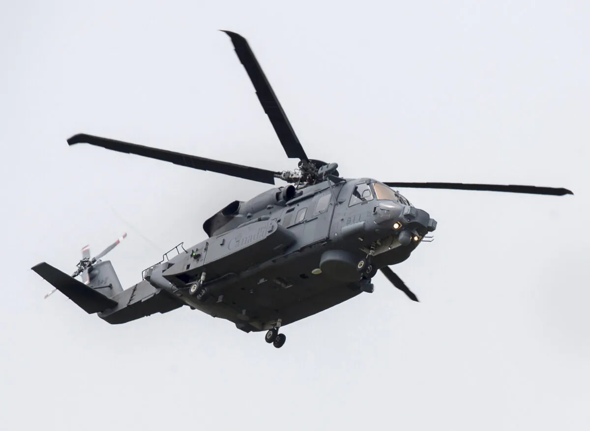A CH-148 Cyclone helicopter flies near the base in Eastern Passage, N.S., June 23, 2020. (The Canadian Press/Andrew Vaughan)