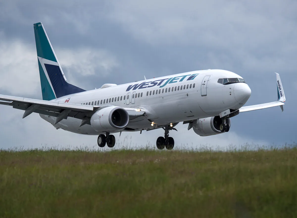 A WestJet flight from Calgary arrives at Halifax Stanfield International Airport in Enfield, N.S., on July 6, 2020. (The Canadian Press/Andrew Vaughan)