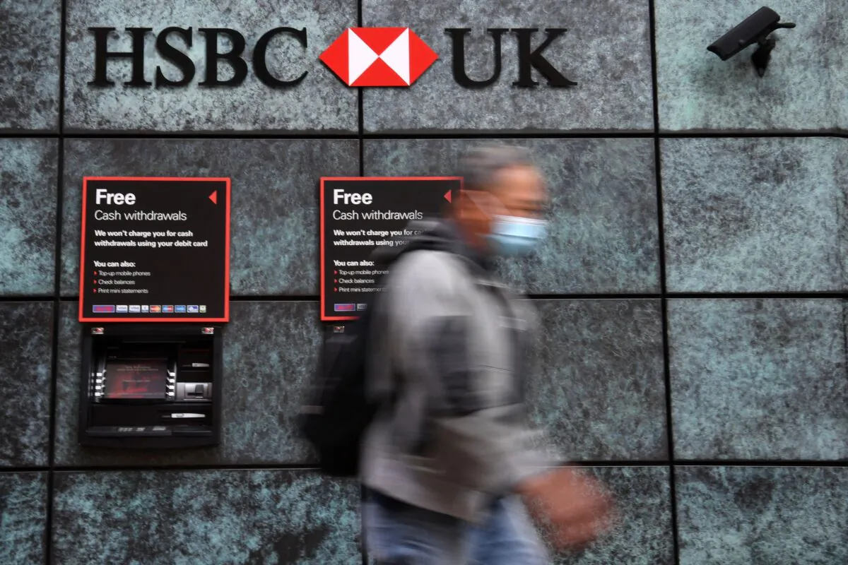 A pedestrian walks past a branch of a HSBC bank in central London on Aug. 3, 2020. (Daniel Leal/AFP via Getty Images)