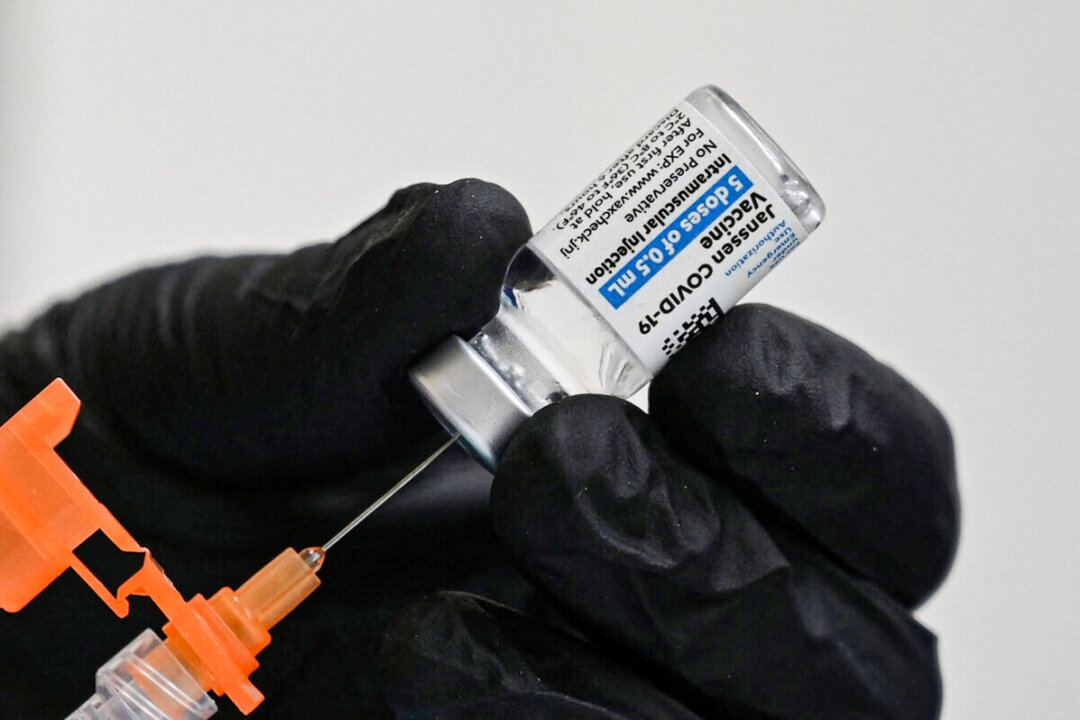 A nurse fills a syrgine with Johnson & Johnson's COVID-19 vaccine at a clinic in Pasadena, Calif., in a file photograph. (Robyn Beck/AFP via Getty Images)