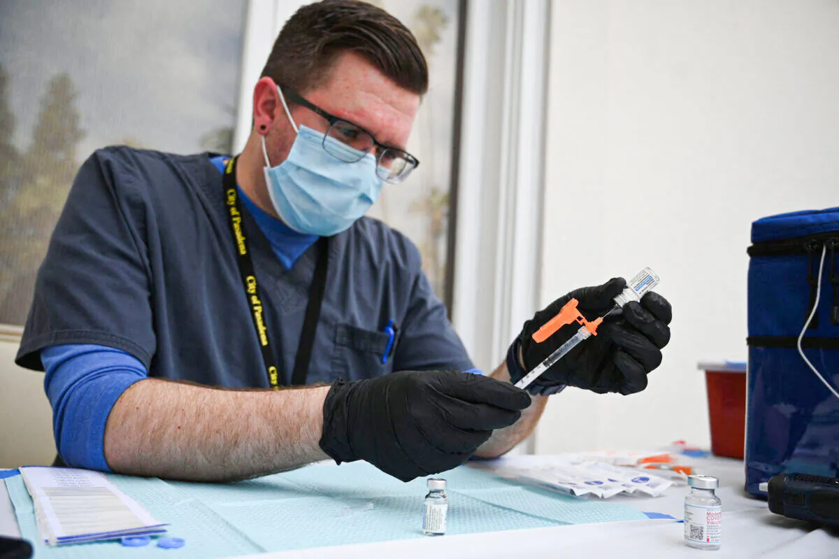 A nurse fills a syringe with Johnson & Johnson's COVID-19 vaccine in Pasadena, Calif., on Aug. 19, 2021. (Robyn Beck/AFP via Getty Images)
