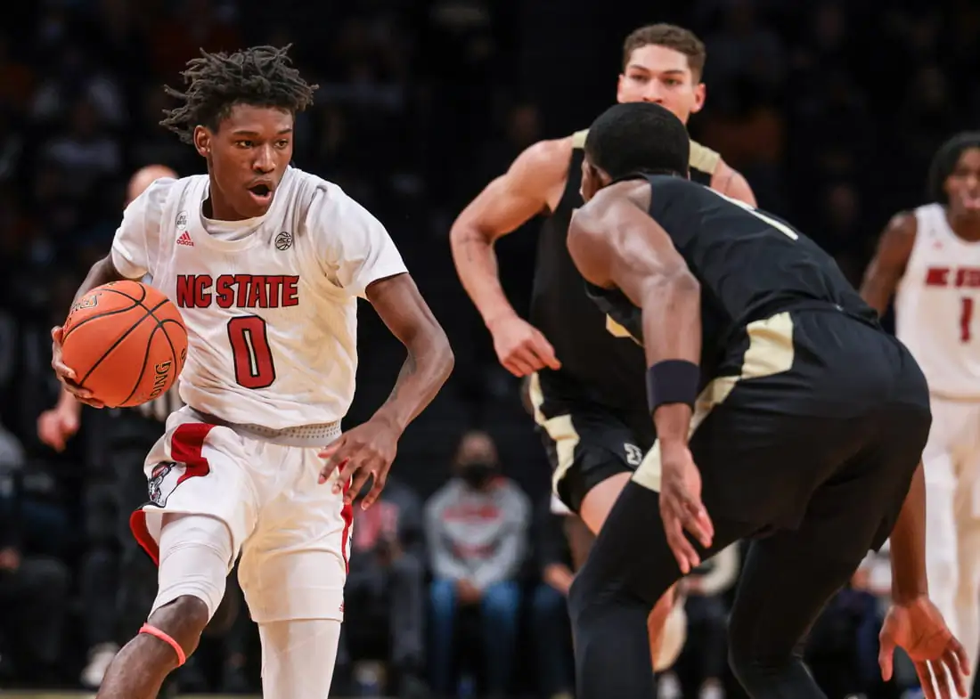 North Carolina State Wolfpack guard Terquavion Smith (0) dribbles up court  against North Carolina State Wolfpack guard Thomas Allen (5) during the second half at Barclays Center, Brooklyn, New York, on Dec 12, 2021. (Vincent Carchietta/USA TODAY Sports Via Field Level Media)