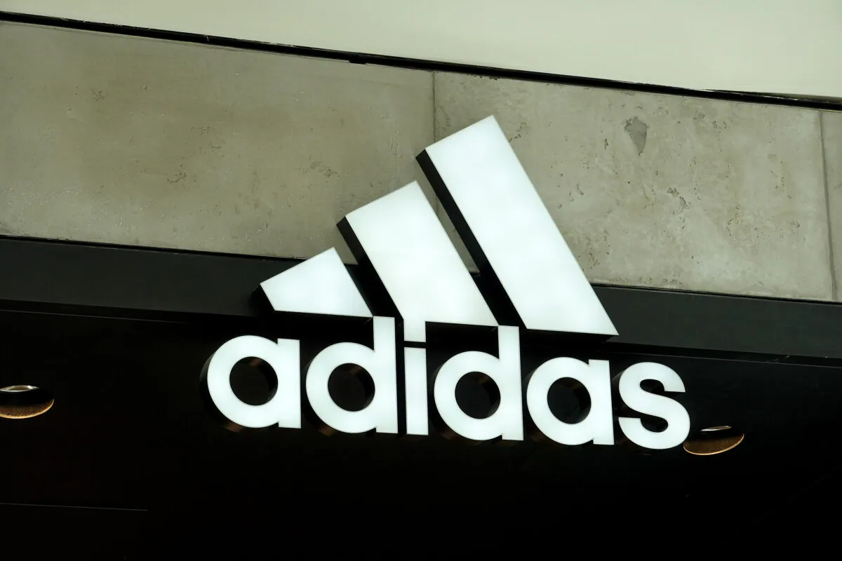 An Adidas sign at the entrance to the store in Miami on Aug. 12, 2021. (Joe Raedle/Getty Images)