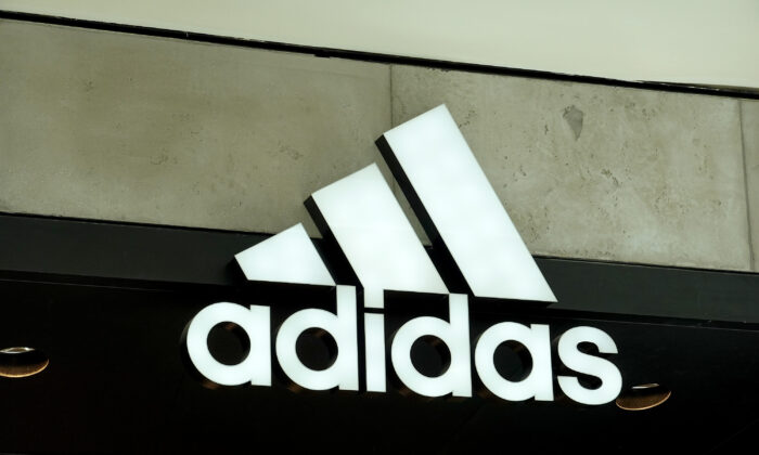An Adidas sign at the entrance to the store in Miami on Aug. 12, 2021. (Joe Raedle/Getty Images)