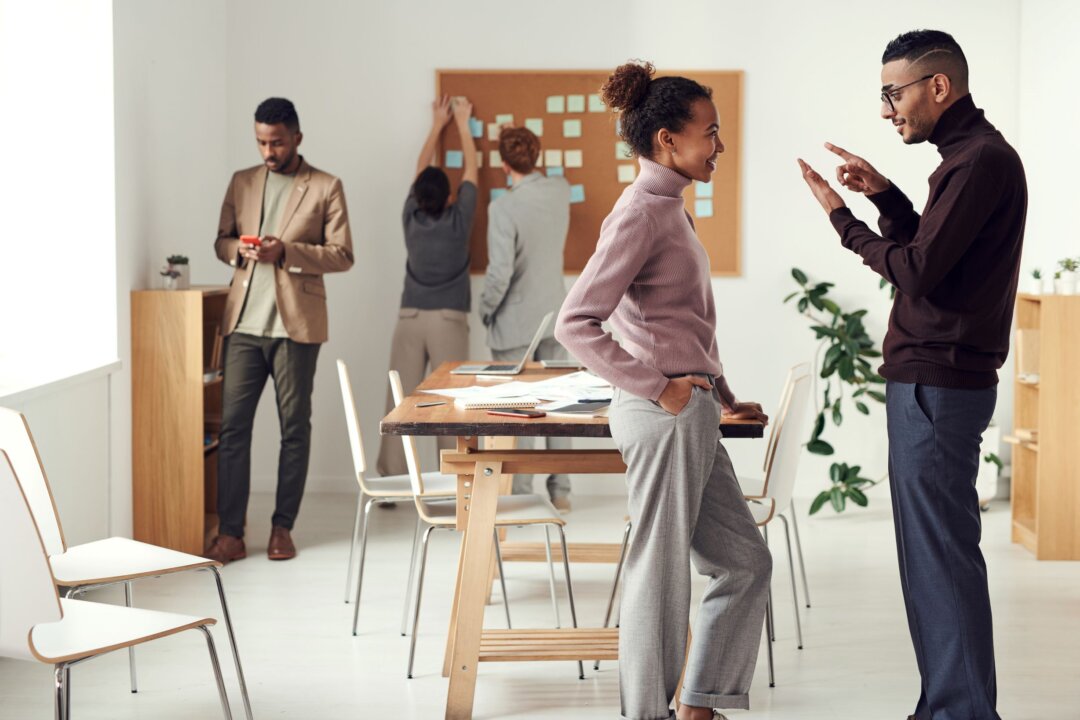 Colleagues listening when communicating with each other. (Fauxels via Pexels)