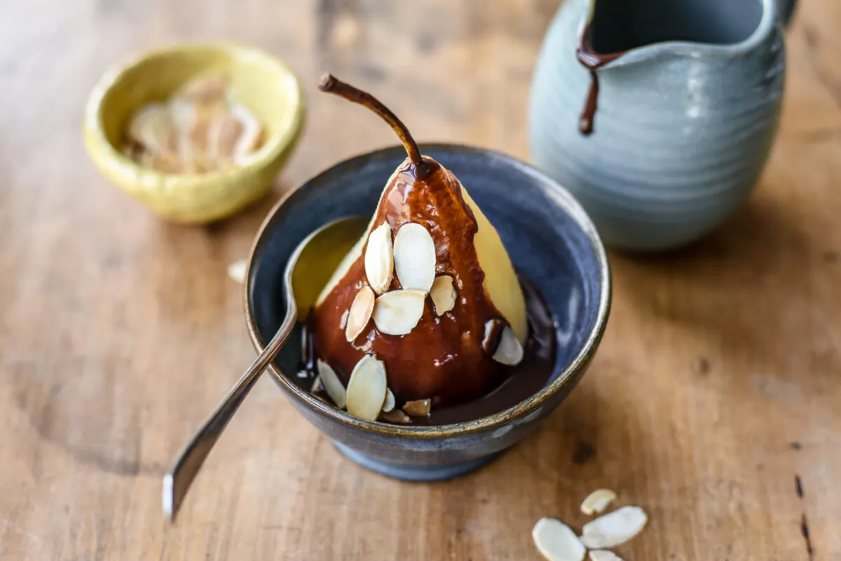 Sweet poached pears pair beautifully with a bittersweet chocolate sauce. (Audrey Le Goff)