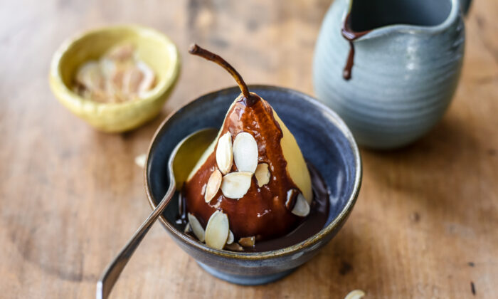Sweet poached pears pair beautifully with a bittersweet chocolate sauce.  (Audrey Le Goff)