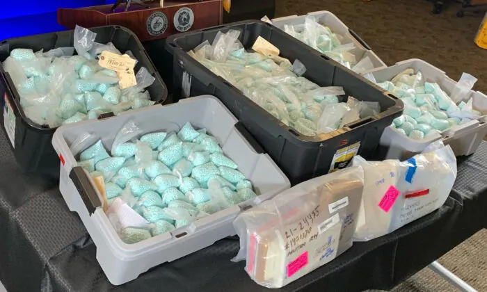 Illicit fentanyl-laced pills and other narcotics are displayed by law enforcement in a file photo. (Scottsdale PD)