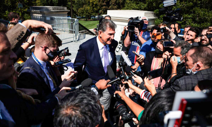 Sen. Joe Manchin (D-W.Va.) speaks to reporters outside the U.S. Capitol on Sept. 30, 2021. (Win McNamee/Getty Images)