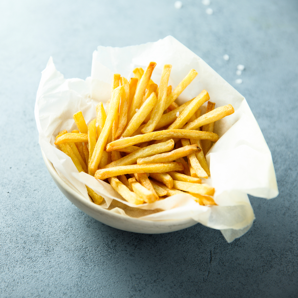 Traditional,French,Fries,In,A,White,Bowl