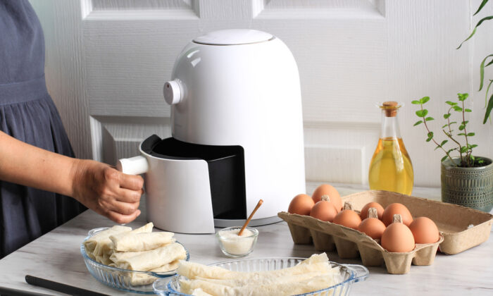 An air fryer is a small countertop convection oven designed to simulate deep-frying without submerging the food in oil. (Ika Rahma H/Shutterstock)