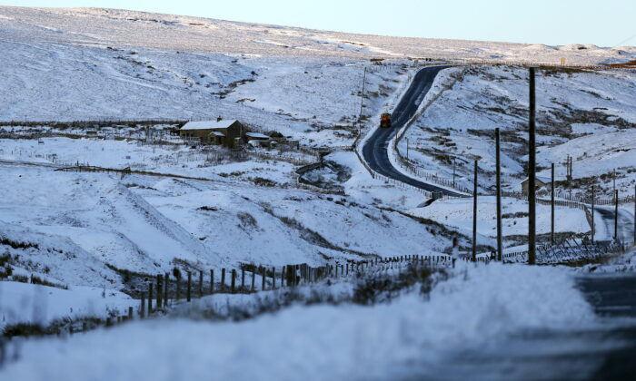 An undated file photo showing land covered snow. (Owen Hymphreys/PA)
