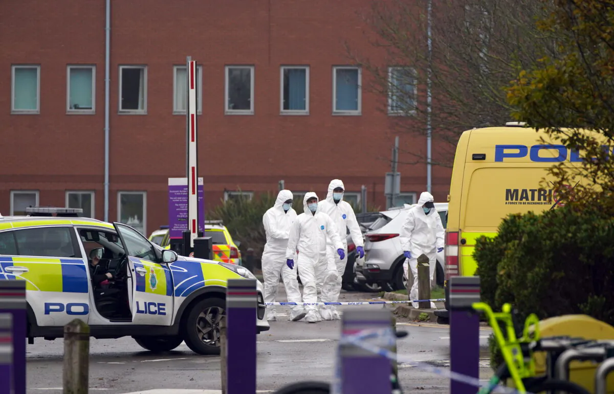 Two days after an explosion killed suspected terrorist Emad Al Swealmeen and injured his taxi driver, forensic officers were seen at the scene outside Liverpool Women's Hospital on Nov. 16, 2021. (Peter Byrne/PA)