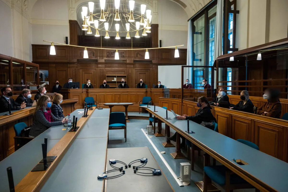 Process participants are pictured at the courtroom, where a trial took place against a Russian defendant, Vadim Krasikov, of gunning down 40-year-old Georgian national Zelimkhan "Tornike" Kavtarashvili, in Berlin, on Dec. 15, 2021. (Christophe Gateau/Pool/AFP via Getty Images)