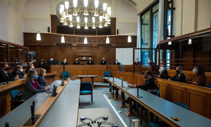 Participants in the process are depicted in court. In court, a trial was held against Russian defendant Vadim Krasikov, who shot down 40-year-old Georgian citizen Zelimkhan. "Tornique" Kavtarashvili, Berlin, December 15, 2021.  (Christophe Gateau / Pool / AFP via Getty Images)