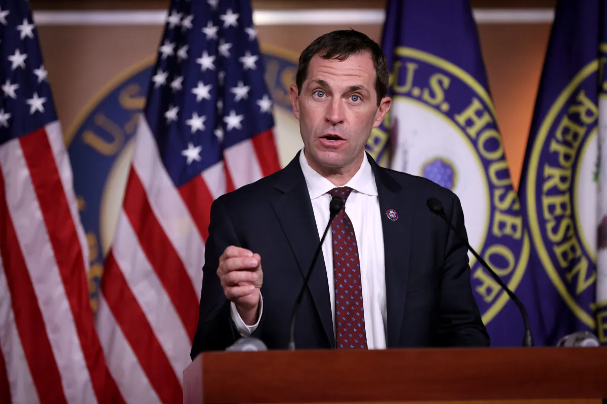 Rep. Jason Crow (D-Colo.), a veteran of the wars in Iraq and Afghanistan, talks to reporters following a caucus meeting at the U.S. Capitol in Washington on Aug. 24, 2021. (Chip Somodevilla/Getty Images)