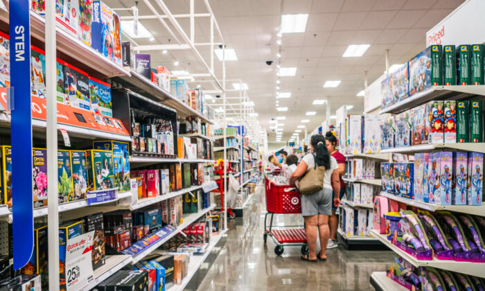 A family shops for toys at a Target store in Houston, Texas, on Oct. 25, 2021. (Brandon Bell/Getty Images)