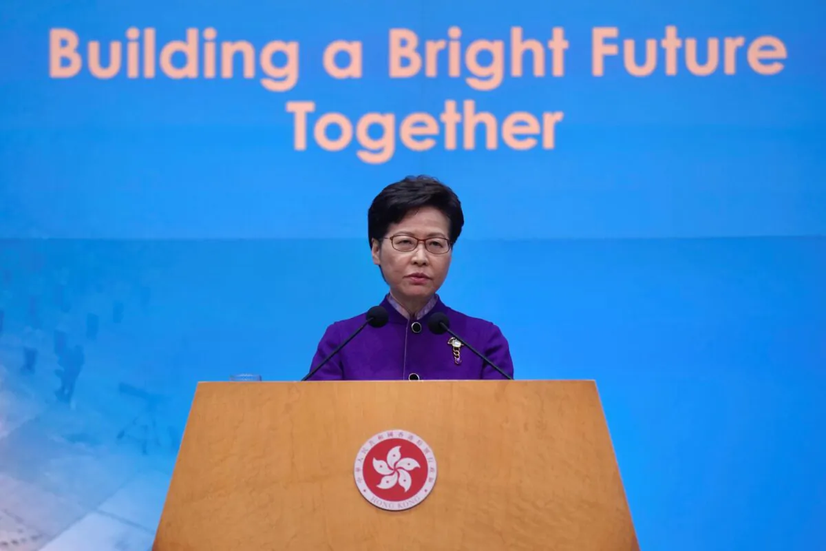 Hong Kong Chief Executive Carrie Lam listens to reporters' questions during a press conference in Hong Kong on Dec. 20, 2021. (Vincent Yu/AP Photo)