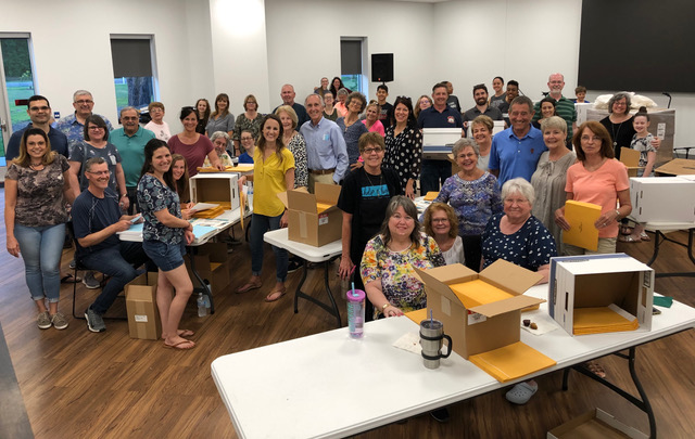 One shift of a large team of volunteers who met on May 3, 2021, in Gainesville, Fla., at one of four multi-day events to assemble Petition Partner Packets for distribution throughout the state. (Mark Minck)