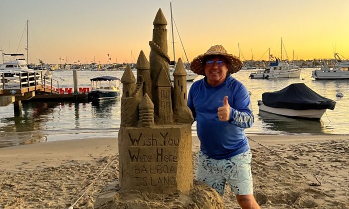 Chris Crosson next to one of his sandcastle creations. (Courtesy of Chris Crosson)
