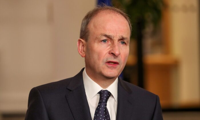 Undated handout photo shows Irish Taoiseach Micheal Martin speaking to the media at government buildings in Dublin on Dec. 17, 2021. (Julien Behal Photography/Handout via PA)
