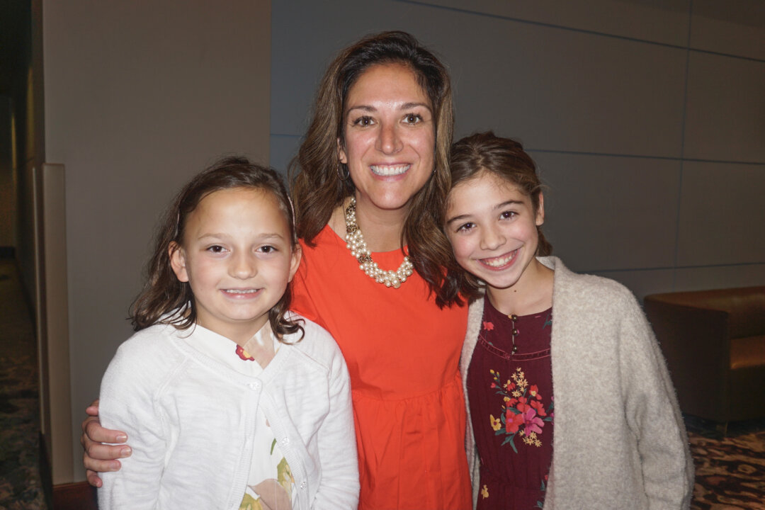 Becky Crosby and daughters attending the Shen Yun Performing at the Arts North Charleston Performing Arts Center, North Charleston, S.C. on Dec. 19, 2021. (Yawen Hung/Epoch Times)