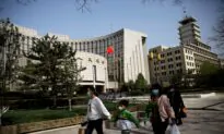 China Cuts Lending Benchmark, Market Sees More Easing in 2022