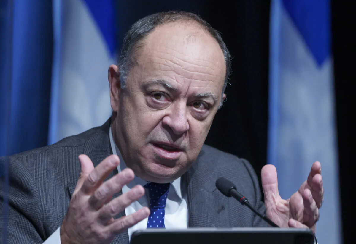 Quebec Health Minister Christian Dube responds to a question during a news conference in Montreal, on Dec. 16, 2021. (The Canadian Press/Paul Chiasson)