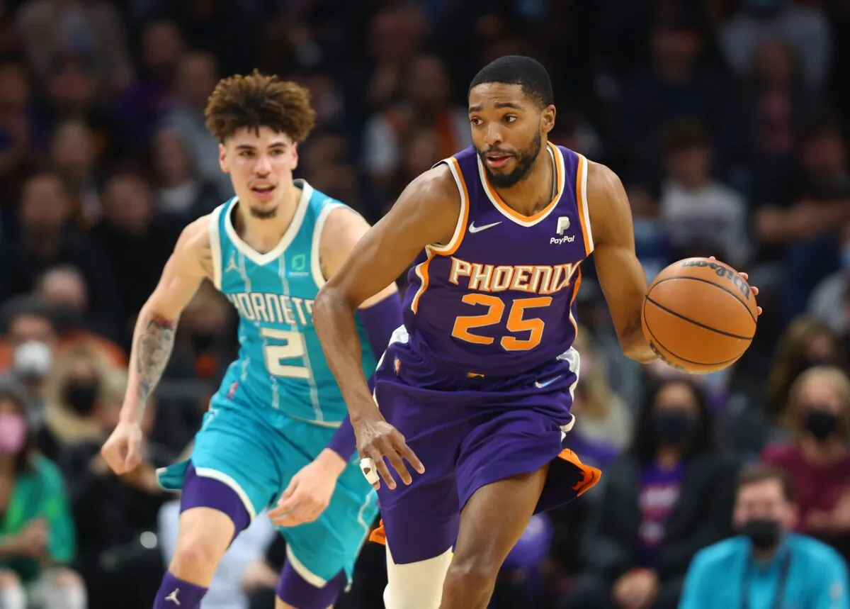 Phoenix Suns forward Mikal Bridges moves the ball against the Charlotte Hornets in the first half at Footprint Center. (Mark J. Rebilas/USA TODAY Sports via Field Level Media)