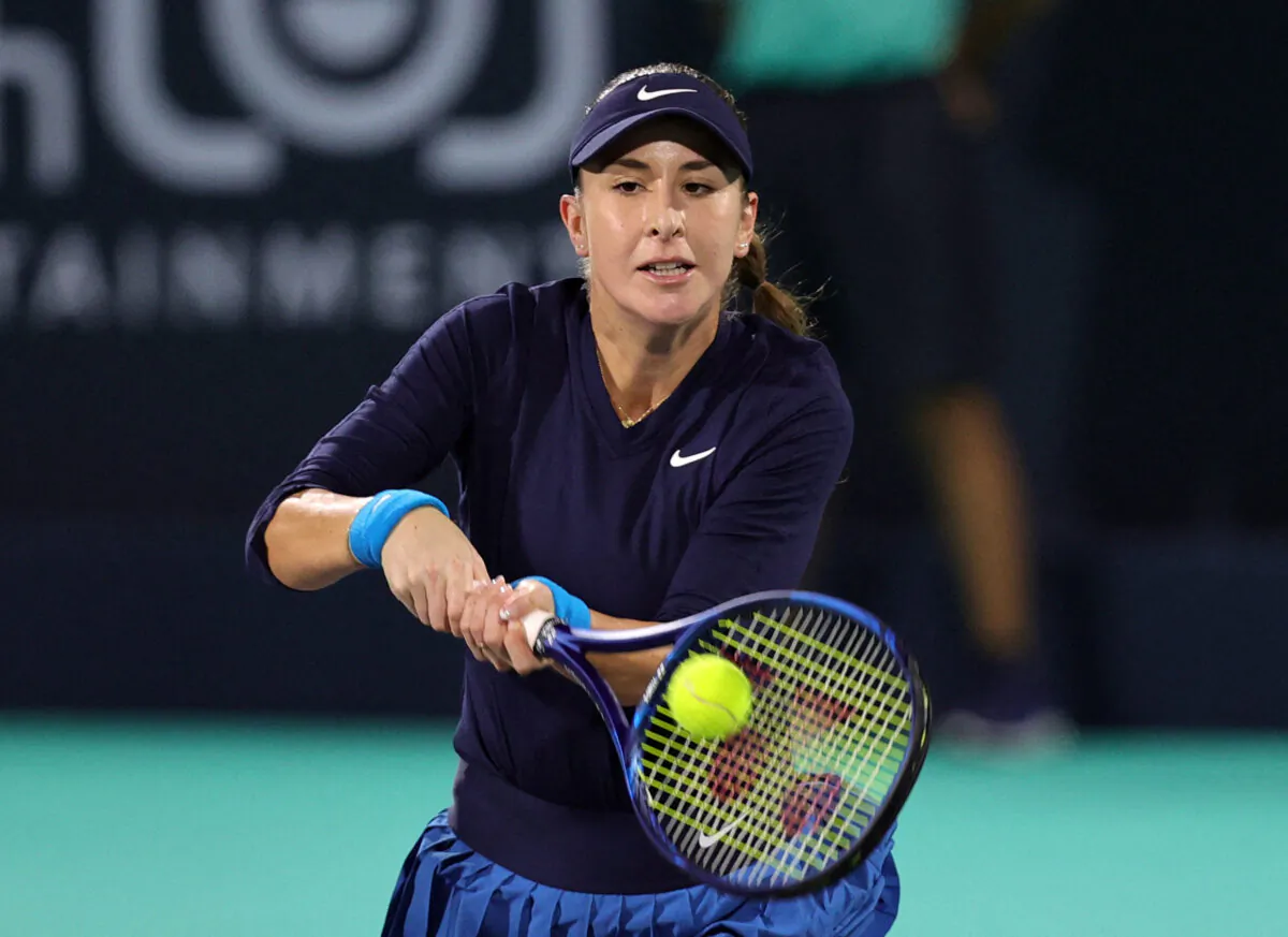 Switzerland's Belinda Bencic in action during her match against Tunisia's Ons Jabeur during Mubadala World Tennis Championship at International Tennis Centre, Zayed Sports City, Abu Dhabi, United Arab Emirates, on Dec. 16, 2021. (Christopher Pike/Reuters)
