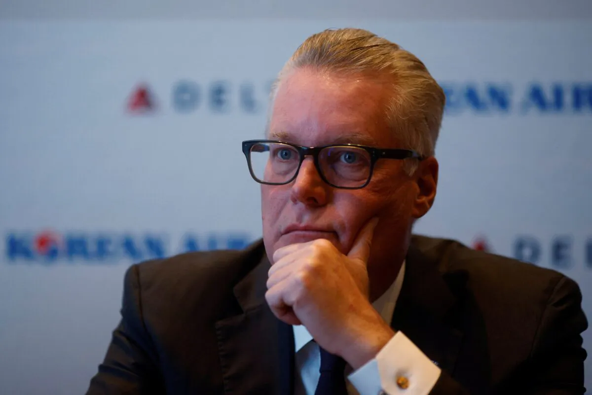 Ed Bastian, CEO of Delta Airlines, answers questions from reporters at the International Air Transport Association’s Annual General Meeting in Boston, on Oct. 3, 2021.   (Brian Snyder/Reuters)
