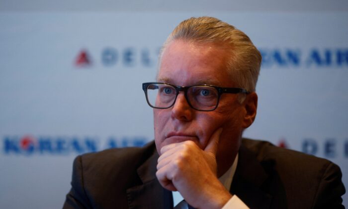Ed Bastian, CEO of Delta Airlines, answers questions from reporters at the International Air Transport Association’s Annual General Meeting in Boston, on Oct. 3, 2021.   (Brian Snyder/Reuters)